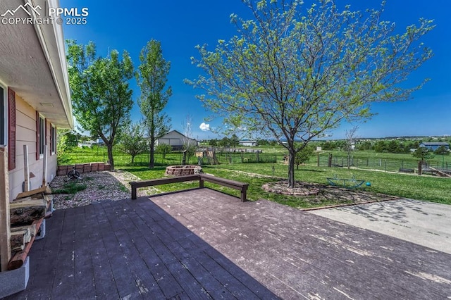 16440 Eastonville Rd, Elbert, CO 80106 - deck featuring a fenced backyard and a patio area