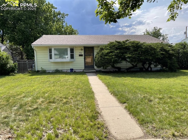 2016 Downing Dr, Colorado Springs, CO 80909 - view of front of home with roof with shingles