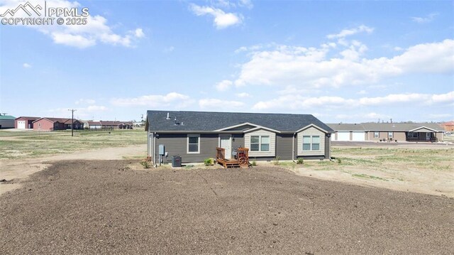 311 Silver St, Hugo, CO 80821 - view of front of house featuring roof with shingles