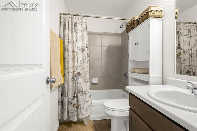 full bath with toilet, shower / tub combo with curtain, and vanity