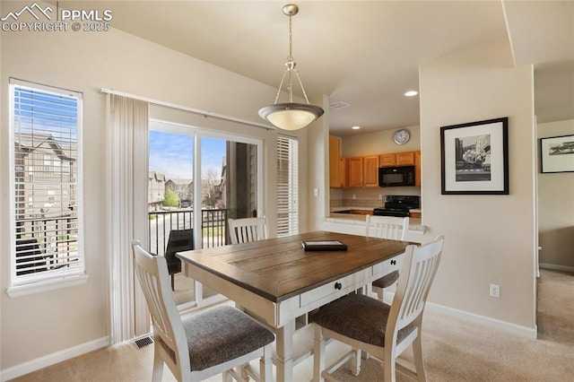 dining area with recessed lighting, baseboards, visible vents, and light carpet