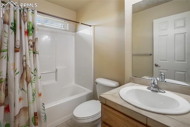 full bathroom with vanity, toilet, and shower / bath combo with shower curtain
