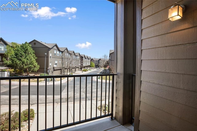 balcony featuring a residential view