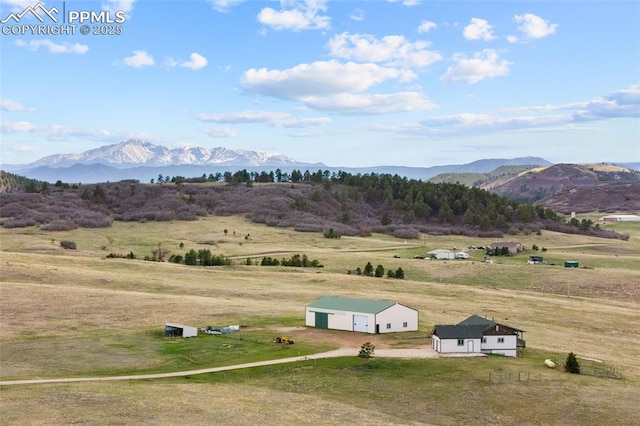 view of mountain feature featuring a rural view