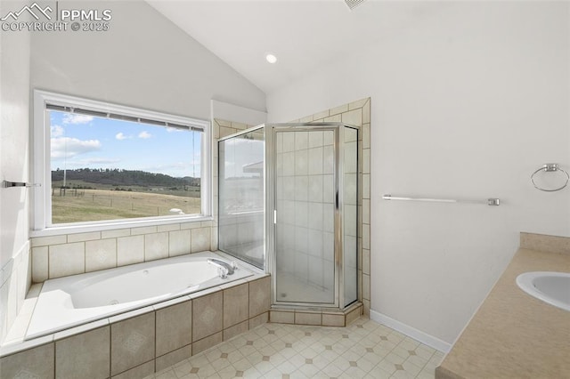 full bathroom featuring tile patterned flooring, a shower stall, a bath, and lofted ceiling