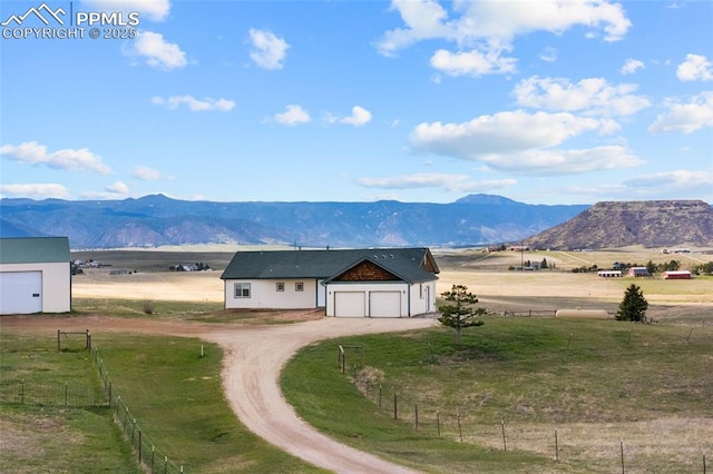 view of mountain feature featuring a rural view