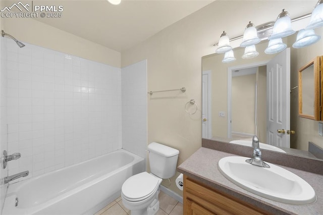 bathroom featuring tile patterned flooring, vanity, bathing tub / shower combination, toilet, and baseboards