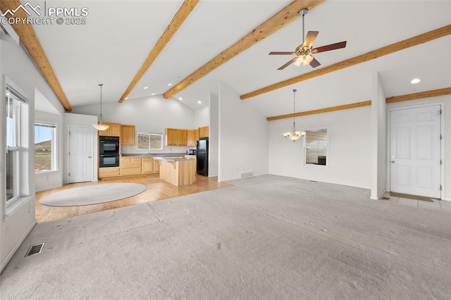 unfurnished living room with a ceiling fan, visible vents, light colored carpet, vaulted ceiling with beams, and recessed lighting