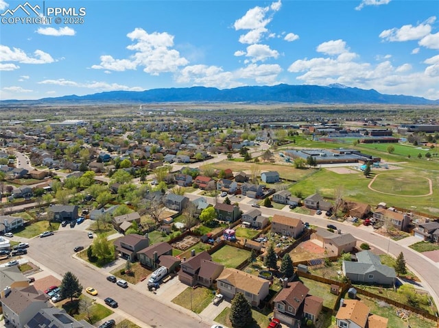 bird's eye view with a residential view and a mountain view