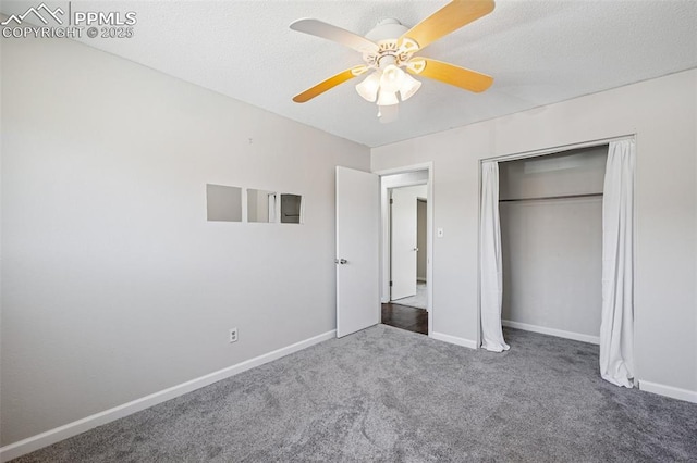 unfurnished bedroom featuring carpet floors, baseboards, a closet, and ceiling fan