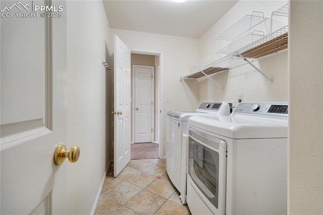 4282 Thornbury Way, Colorado Springs, CO 80922 - laundry room featuring washing machine and dryer, baseboards, and light tile patterned floors