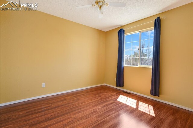 4282 Thornbury Way, Colorado Springs, CO 80922 - unfurnished room featuring wood finished floors, a textured ceiling, baseboards, and a ceiling fan