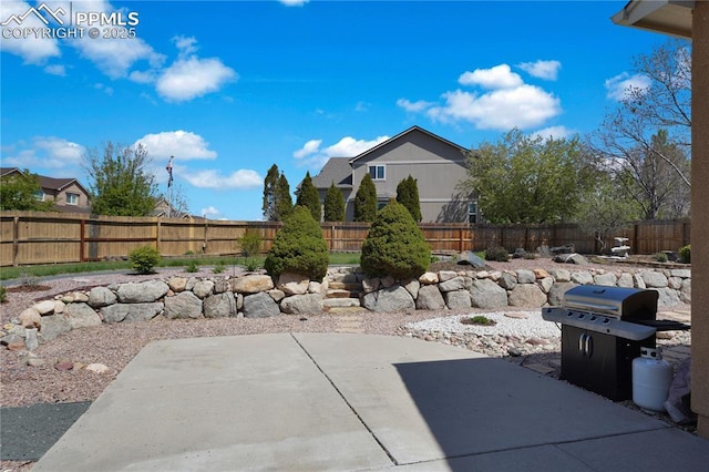 4282 Thornbury Way, Colorado Springs, CO 80922 - view of patio featuring a fenced backyard and grilling area