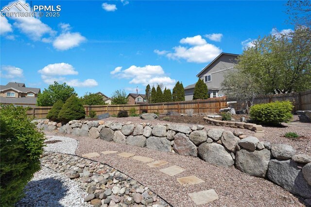 4282 Thornbury Way, Colorado Springs, CO 80922 - fenced backyard featuring a residential view