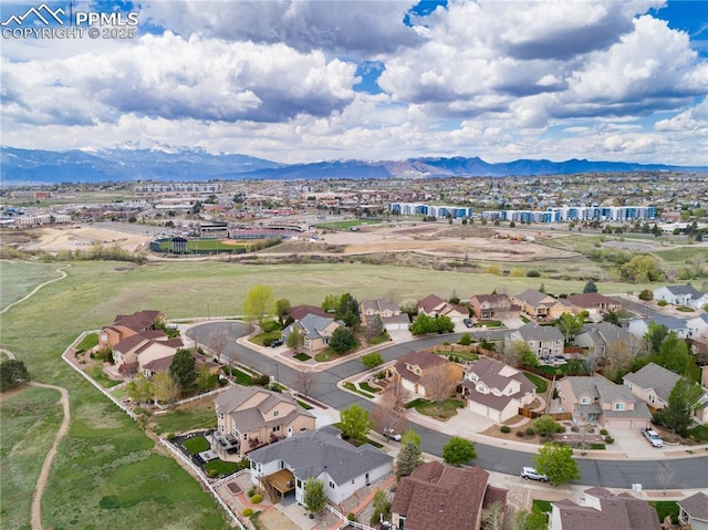 4282 Thornbury Way, Colorado Springs, CO 80922 - aerial perspective of suburban area featuring mountains
