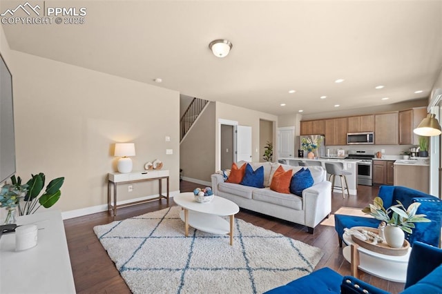 2972 Namib Dr, Colorado Springs, CO 80939 - living area featuring recessed lighting, baseboards, dark wood-style floors, and stairs