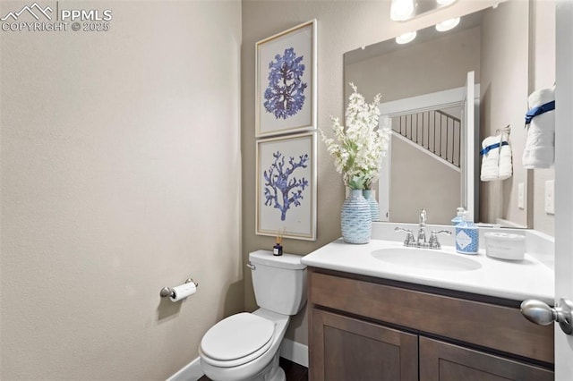 2972 Namib Dr, Colorado Springs, CO 80939 - half bath with toilet, baseboards, and vanity