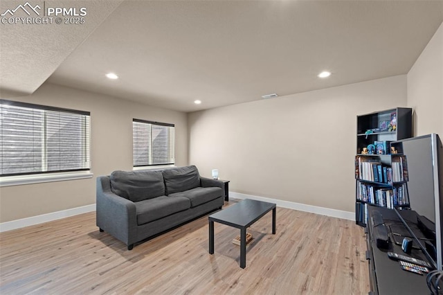 2972 Namib Dr, Colorado Springs, CO 80939 - living area featuring recessed lighting, baseboards, visible vents, and light wood-style flooring