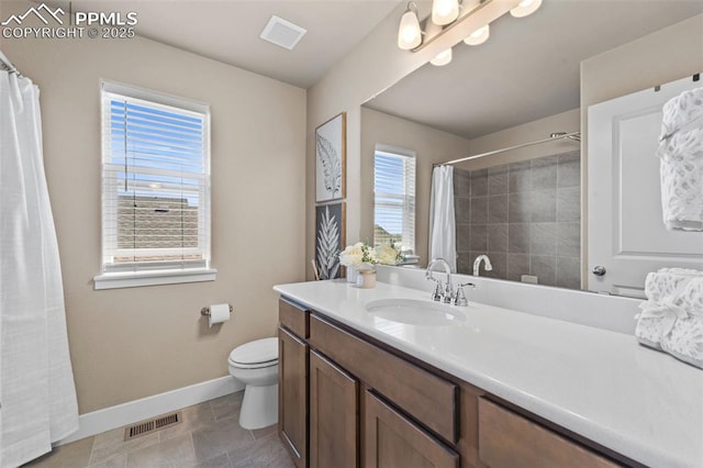 2972 Namib Dr, Colorado Springs, CO 80939 - bathroom featuring toilet, baseboards, visible vents, and vanity