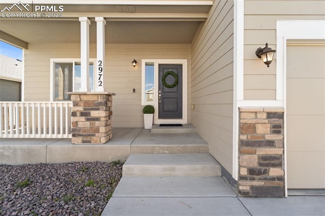 2972 Namib Dr, Colorado Springs, CO 80939 - property entrance featuring a porch