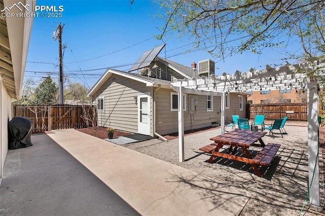 1415 E Boulder St, Colorado Springs, CO 80909 - view of patio / terrace featuring a fenced backyard, a pergola, a gate, and cooling unit
