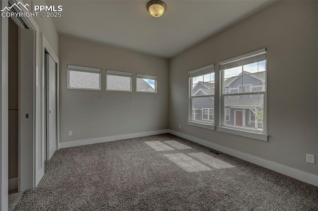 275 Eclipse Dr, Colorado Springs, CO 80905 - spare room featuring carpet and baseboards