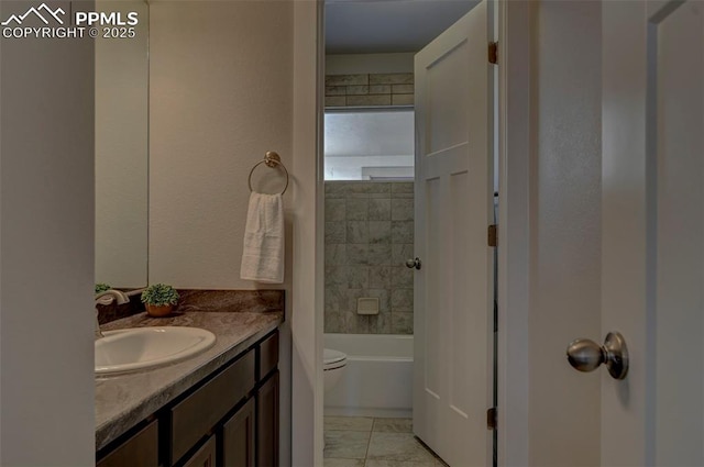 275 Eclipse Dr, Colorado Springs, CO 80905 - bathroom featuring vanity, toilet, and bathing tub / shower combination