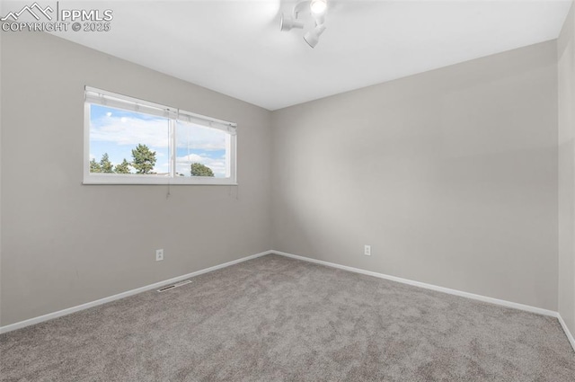 3435 Montebello Dr, Colorado Springs, CO 80918 - carpeted spare room with baseboards and visible vents