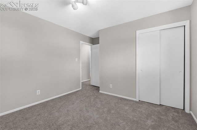 3435 Montebello Dr, Colorado Springs, CO 80918 - unfurnished bedroom featuring baseboards, carpet, and a closet