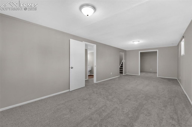 3435 Montebello Dr, Colorado Springs, CO 80918 - basement featuring baseboards, carpet, and stairs
