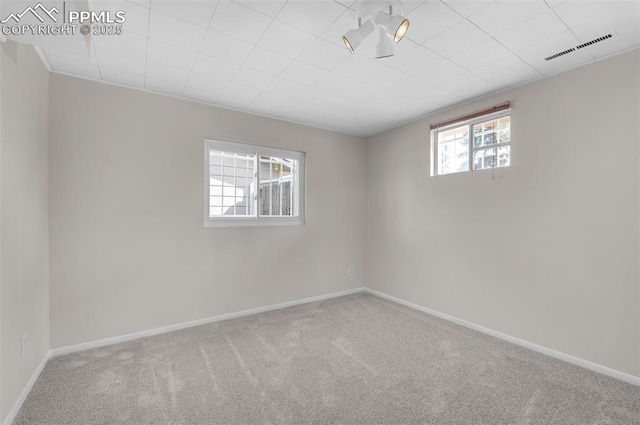 3435 Montebello Dr, Colorado Springs, CO 80918 - empty room featuring baseboards, carpet flooring, and visible vents