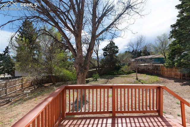 3435 Montebello Dr, Colorado Springs, CO 80918 - wooden terrace featuring a fenced backyard