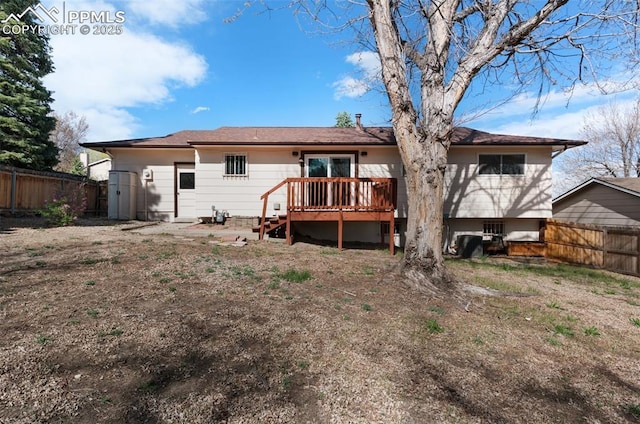 3435 Montebello Dr, Colorado Springs, CO 80918 - back of house featuring a deck and a fenced backyard