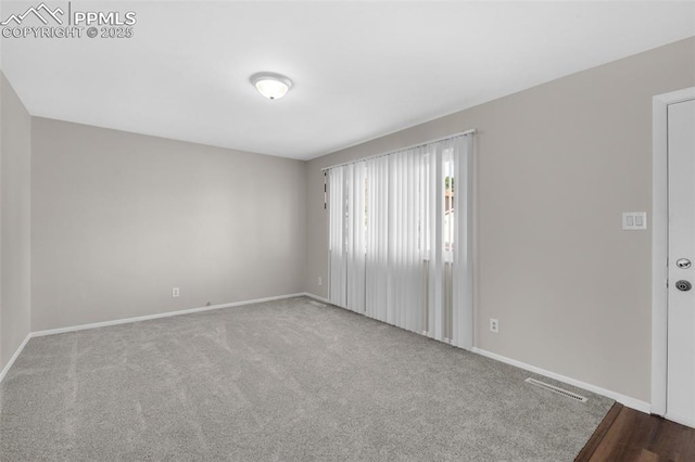 3435 Montebello Dr, Colorado Springs, CO 80918 - carpeted empty room featuring baseboards and visible vents