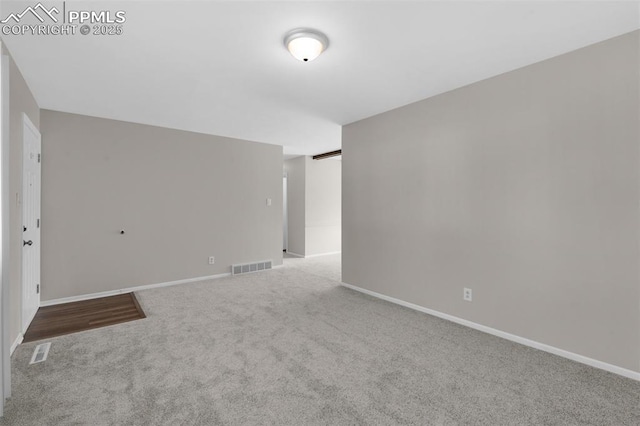 3435 Montebello Dr, Colorado Springs, CO 80918 - spare room featuring baseboards, carpet flooring, and visible vents