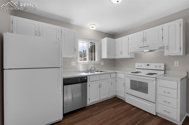 3435 Montebello Dr, Colorado Springs, CO 80918 - kitchen with a sink, under cabinet range hood, white cabinets, and white appliances