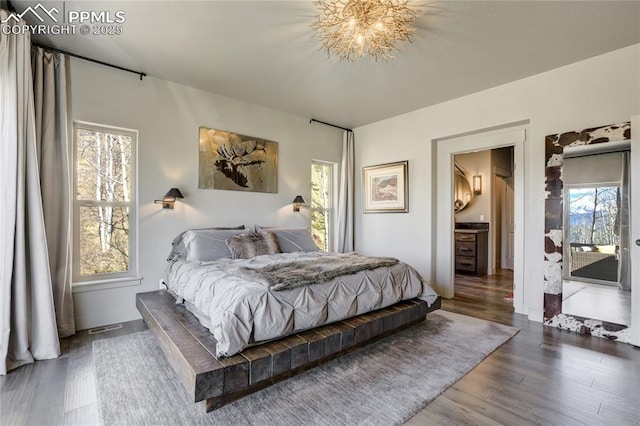 bedroom featuring wood finished floors