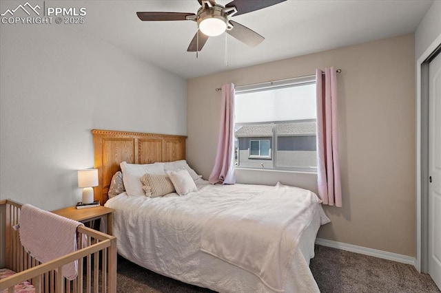 carpeted bedroom featuring baseboards and ceiling fan
