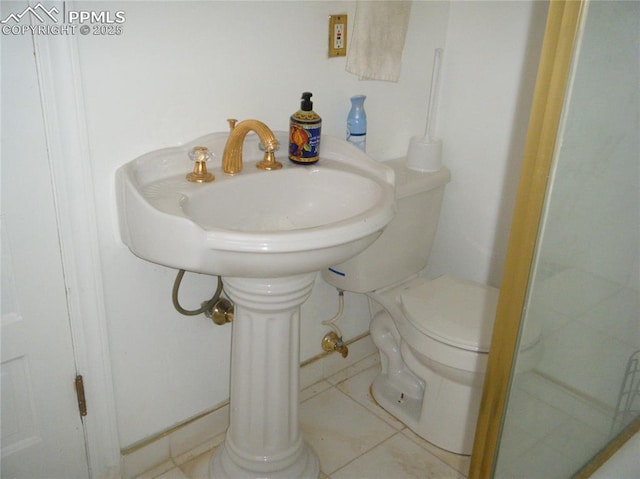 415 Veta Ave, Pueblo, CO 81004 - bathroom with tile patterned flooring and toilet