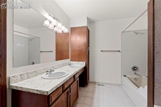 full bath featuring tile patterned flooring, a sink, double vanity, and  shower combination