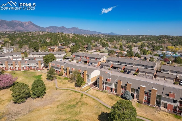 birds eye view of property featuring a residential view and a mountain view