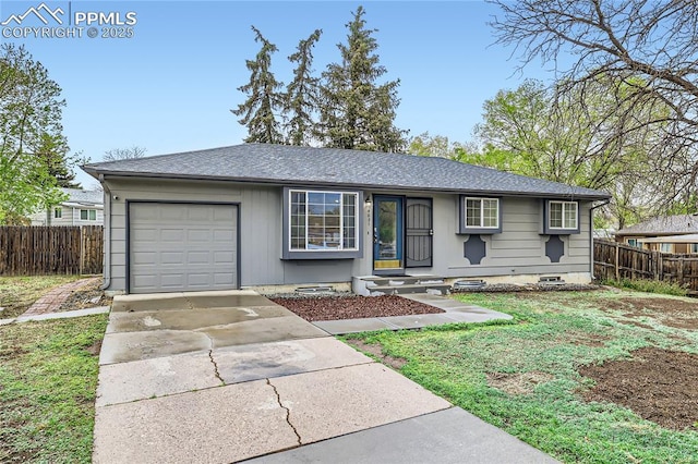 single story home with a shingled roof, driveway, fence, and a garage