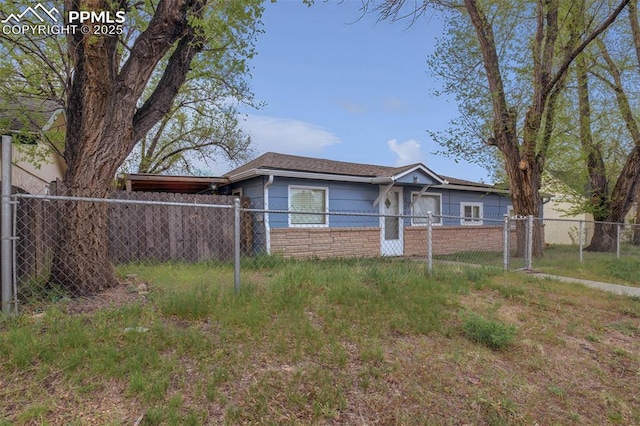 view of front of property featuring fence private yard