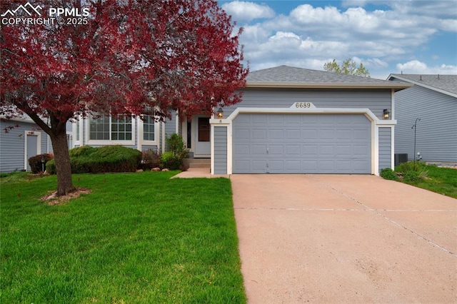 view of front facade with a garage, a shingled roof, driveway, and a front lawn