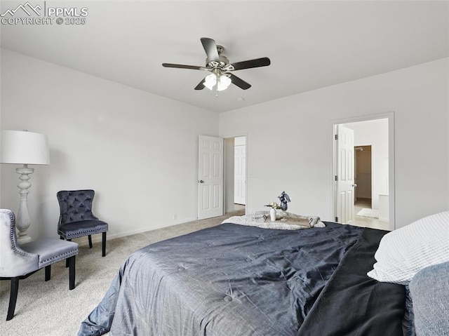 bedroom featuring baseboards, carpet flooring, connected bathroom, and a ceiling fan