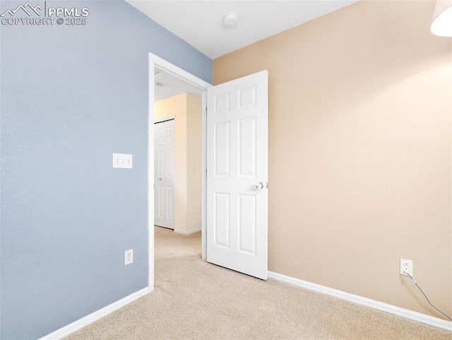 5346 Gentle Wind Rd, Colorado Springs, CO 80922 - empty room with light carpet, a smoke detector, and baseboards