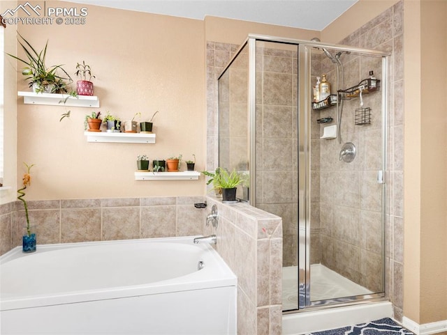 5346 Gentle Wind Rd, Colorado Springs, CO 80922 - bathroom with a bath and a stall shower