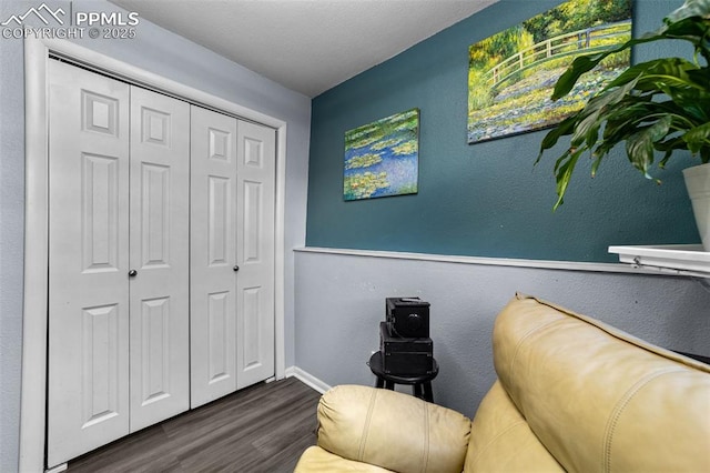 1065 N 19th St, Colorado Springs, CO 80904 - sitting room featuring baseboards and wood finished floors