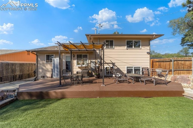 1065 N 19th St, Colorado Springs, CO 80904 - back of house featuring a fenced backyard, a pergola, a yard, and a deck