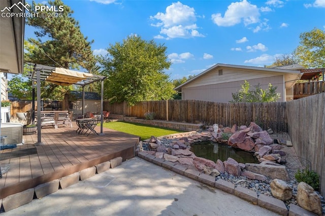 1065 N 19th St, Colorado Springs, CO 80904 - view of yard with a fenced backyard, a wooden deck, and a pergola